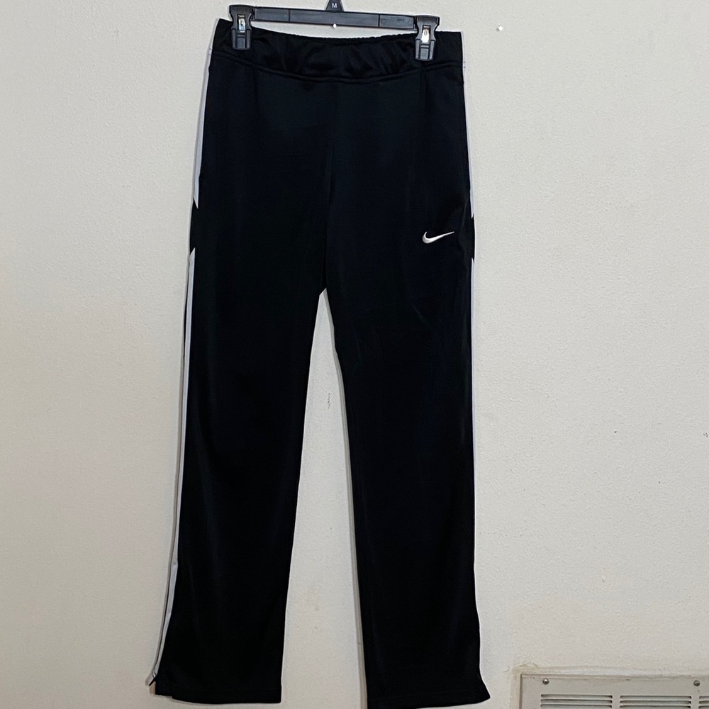 Nike lined sweat pant w/ankle zip. Size small.
